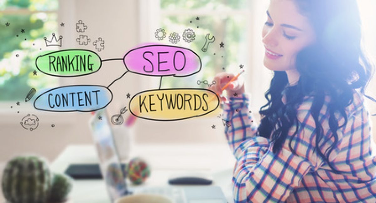 SEO concept with young woman holding a pencil