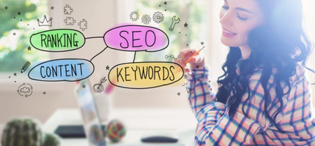 SEO concept with young woman holding a pencil