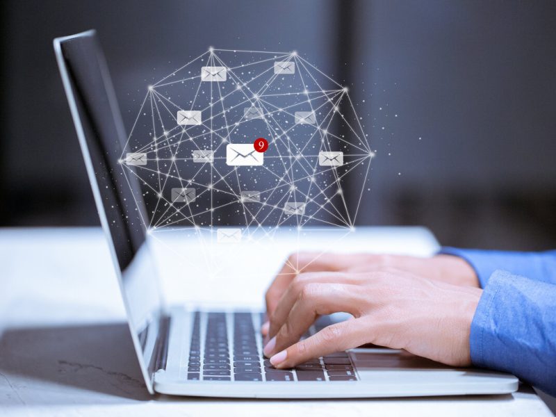 rsz_business-using-laptop-with-email-icon-email-inbox-electronic-communication-graphics-concept